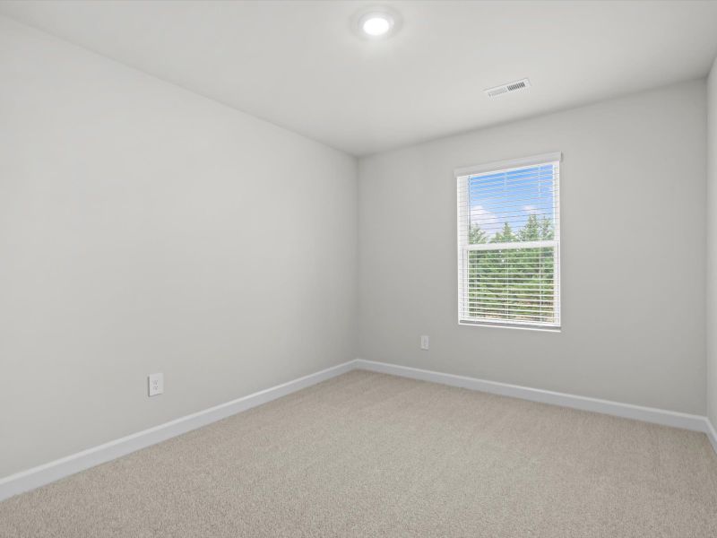 Spacious, unfurnished interior of a new home in Crossing at Abner Creek Townes, Greer (Image 18).