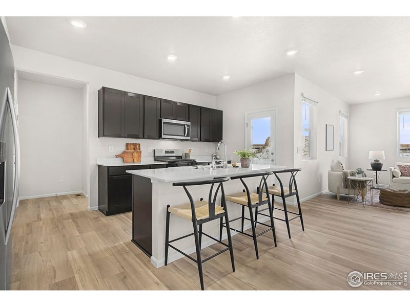 Furnished interior view inside a new home in Lake Bluff, Greeley (Image 8).