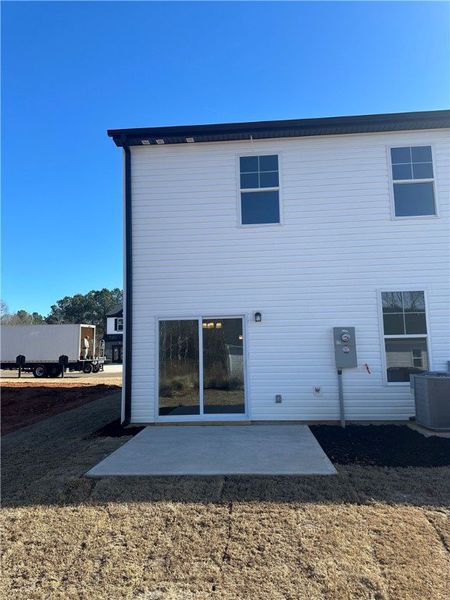Exterior details and patio area of a home in Meece Townhomes, Easley (Image 3).