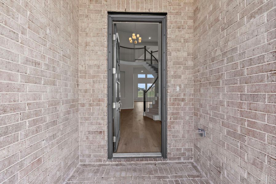 Exterior details and patio area of a home in Pomona, Manvel (Image 23).