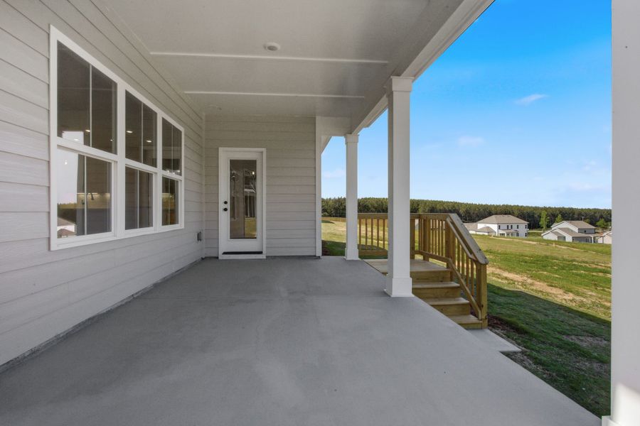 Exterior details and patio area of a home in Cherokee Knoll, Williamston (Image 18).