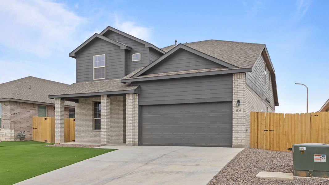 Representative exterior photo of a completed home built from the Shelby by D.R. Horton in Legacy South, Midland, TX (Image 17).