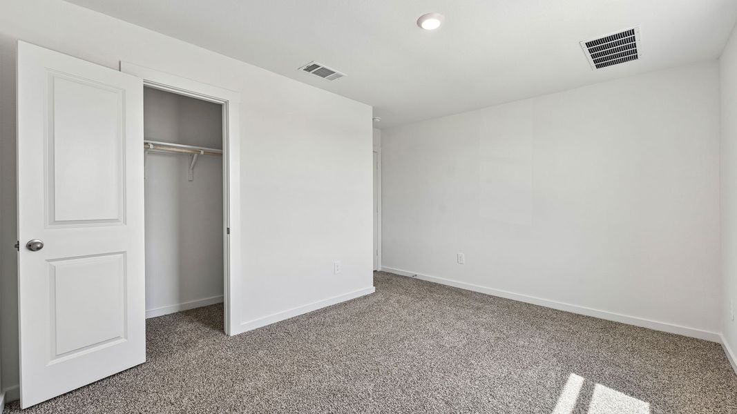 Spacious, unfurnished interior of a new home in Monarch Ranch, Manor (Image 40).