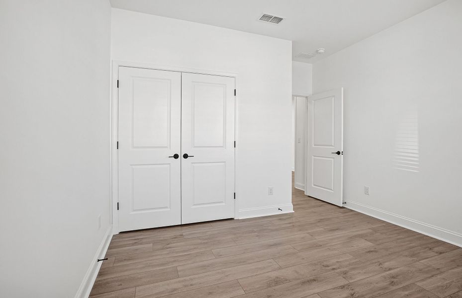 Spacious, unfurnished interior of a new home in Carolina Riverside, Belmont (Image 28).