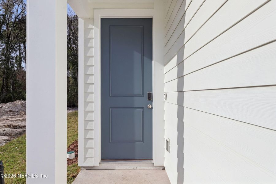 Exterior details and patio area of a home in Cypress Meadows - The Villas, Jacksonville (Image 24).