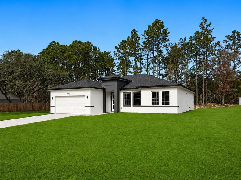 Front exterior of a new home in , Ocala, FL, highlighting curb appeal (Image 19). Front exterior of a new home in , Ocala, FL, highlighting curb appeal (Image 19).