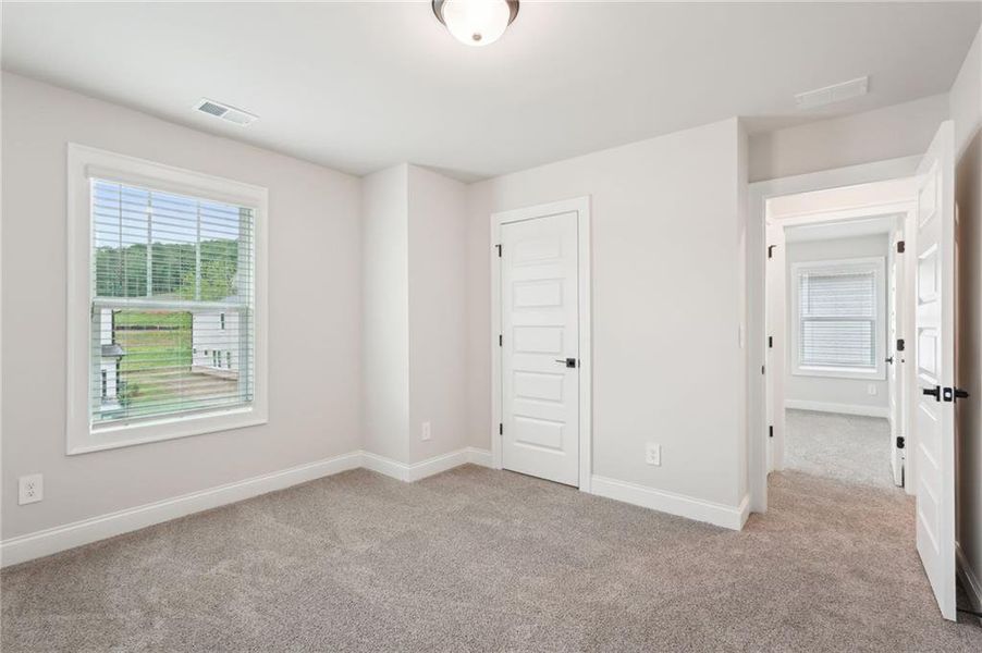 Spacious, unfurnished interior of a new home in Hemingway - Reserve Series, Cumming (Image 38).