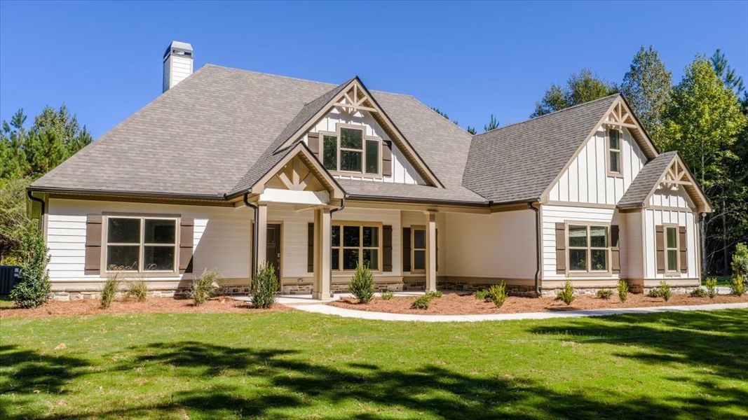 Front exterior of a new home in White Oaks, The Rock, GA, highlighting curb appeal (Image 21).