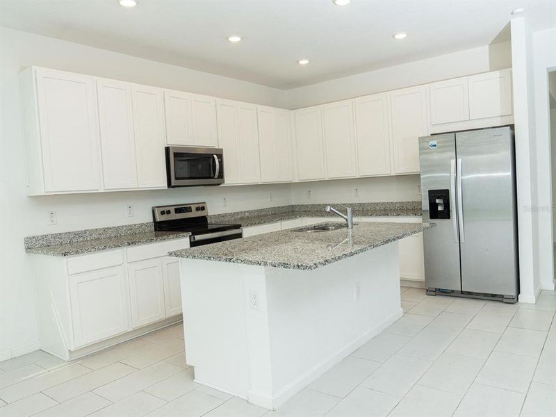 Furnished interior view inside a new home in Cypress Park Estates, Haines City (Image 5).