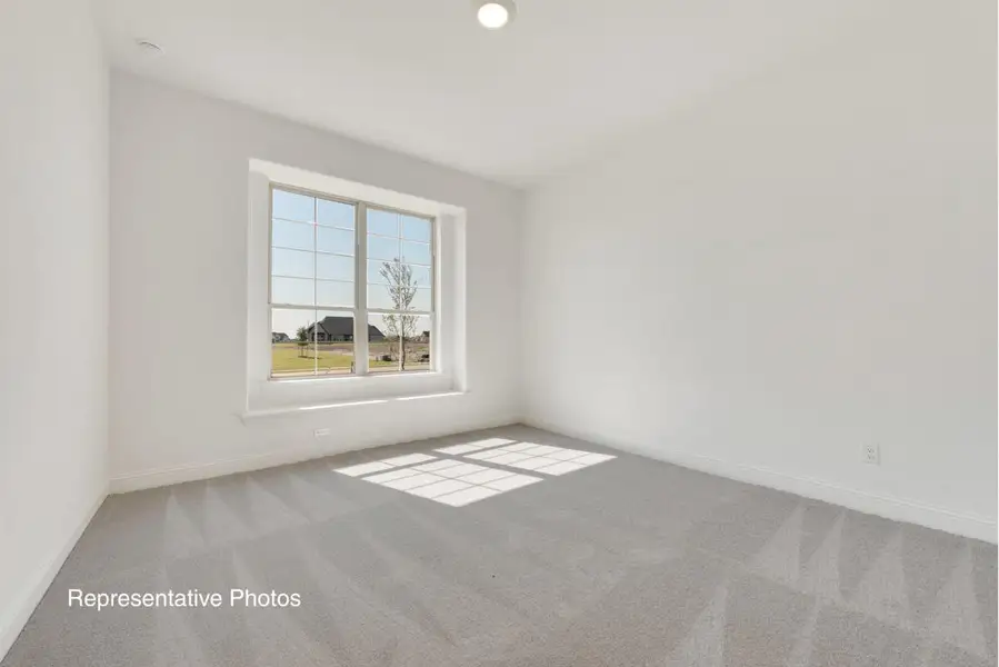 Representative unfurnished interior of a home built from the Grand Estate by Grand Homes in Kings Crossing, Parker (Image 27).