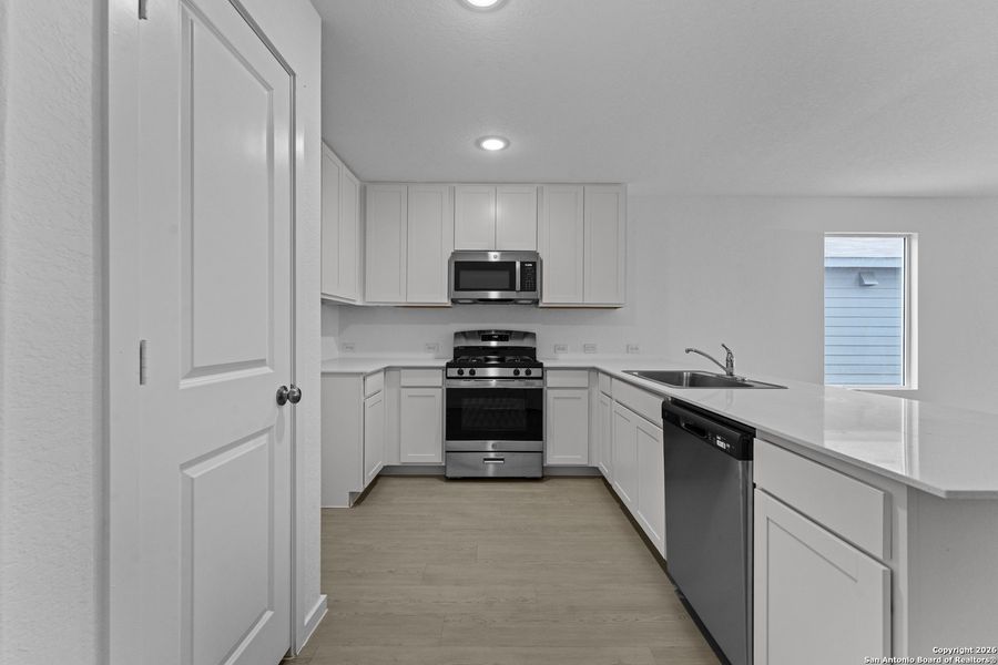 Furnished interior view inside a new home in Voss Farms, New Braunfels (Image 7).