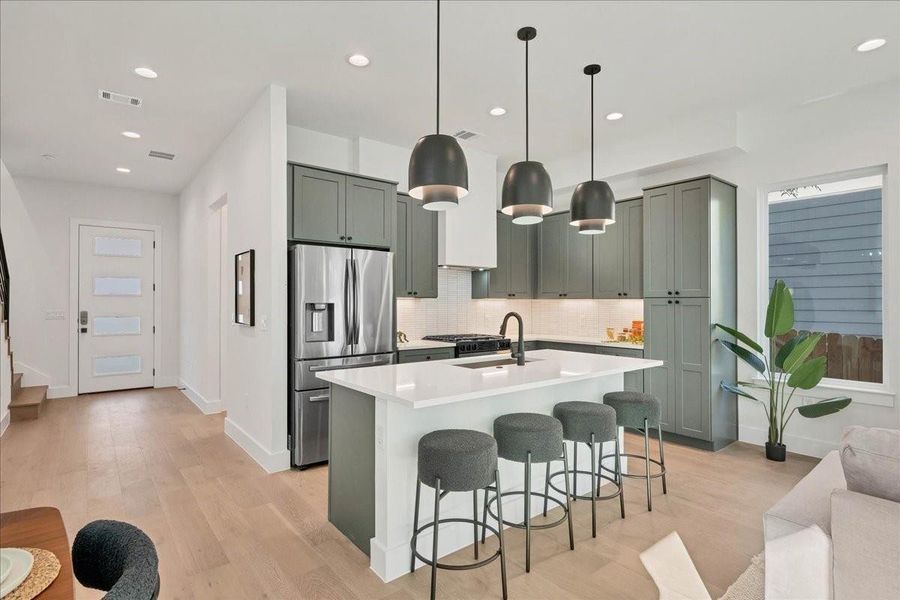 Kitchen view showing entry way