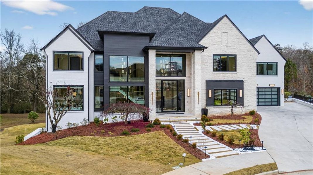 Front exterior of a new home in , Suwanee, GA, highlighting curb appeal (Image 25).