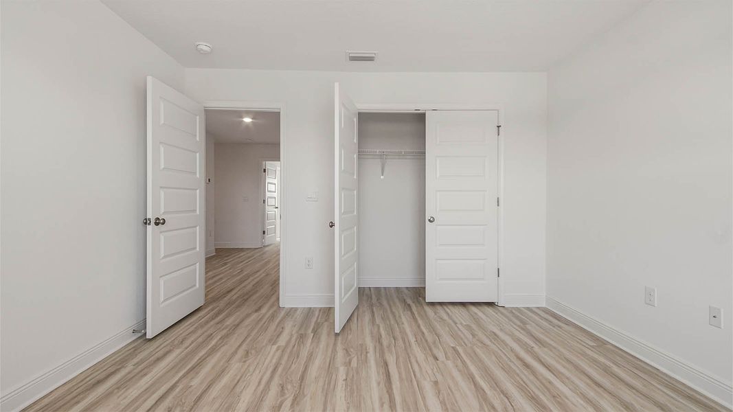 Spacious, unfurnished interior of a new home in WindMark Beach, Port Saint Joe (Image 32).