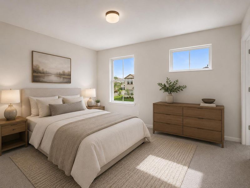 Natural light fills this primary bedroom, featuring a plush carpet underfoot. Natural light fills this primary bedroom, featuring a plush carpet underfoot.