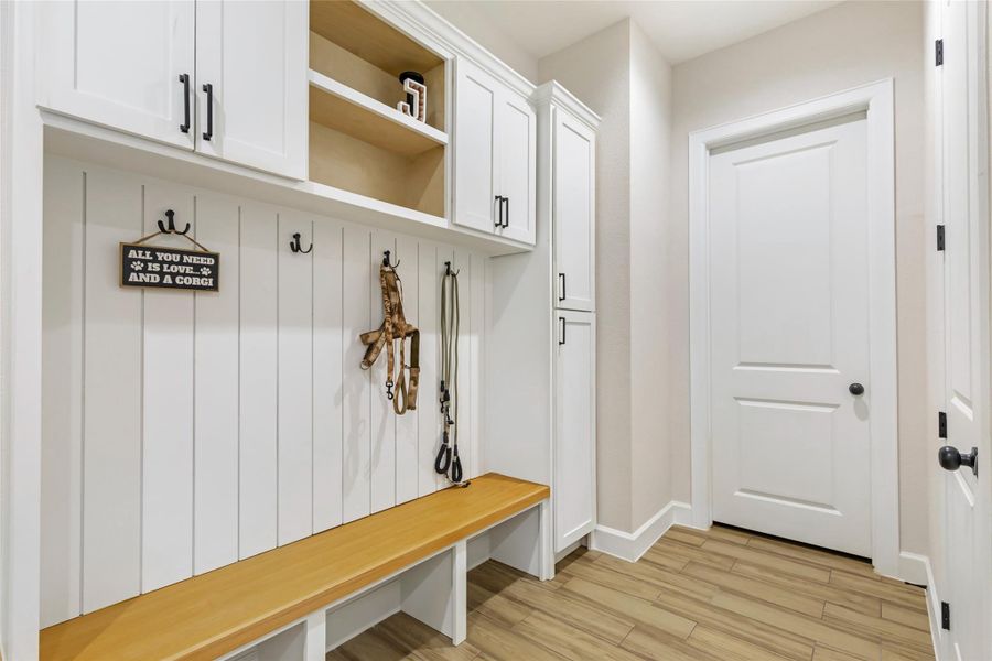 Mud Room Area with Access to Garage & Laundry Room