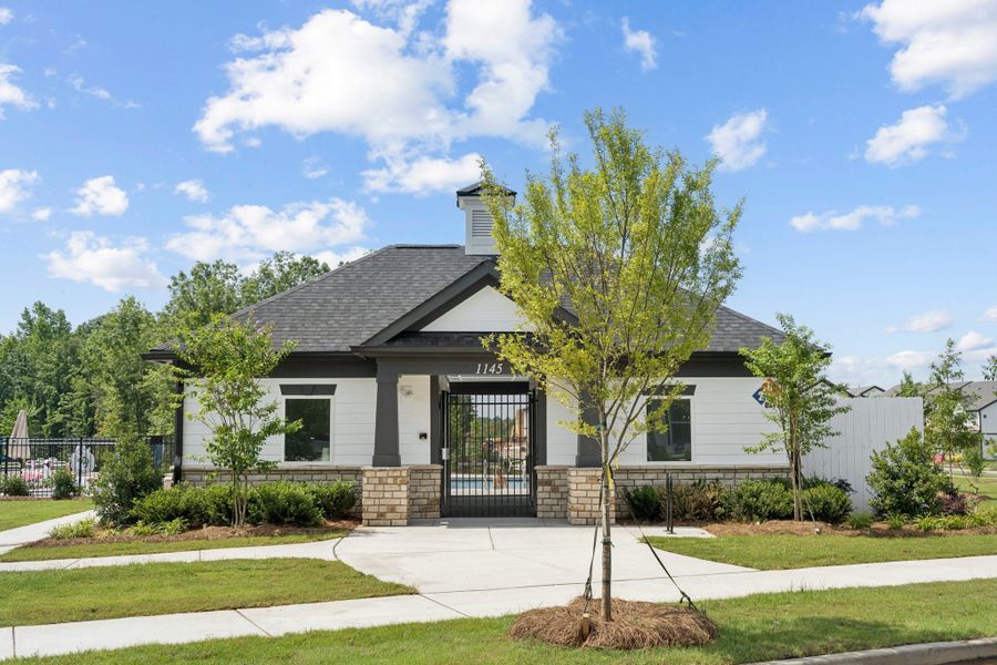 Front exterior of a new home in Ridge at Sugar Creek, Fort Mill, NC, highlighting curb appeal (Image 2). Front exterior of a new home in Ridge at Sugar Creek, Fort Mill, NC, highlighting curb appeal (Image 2).