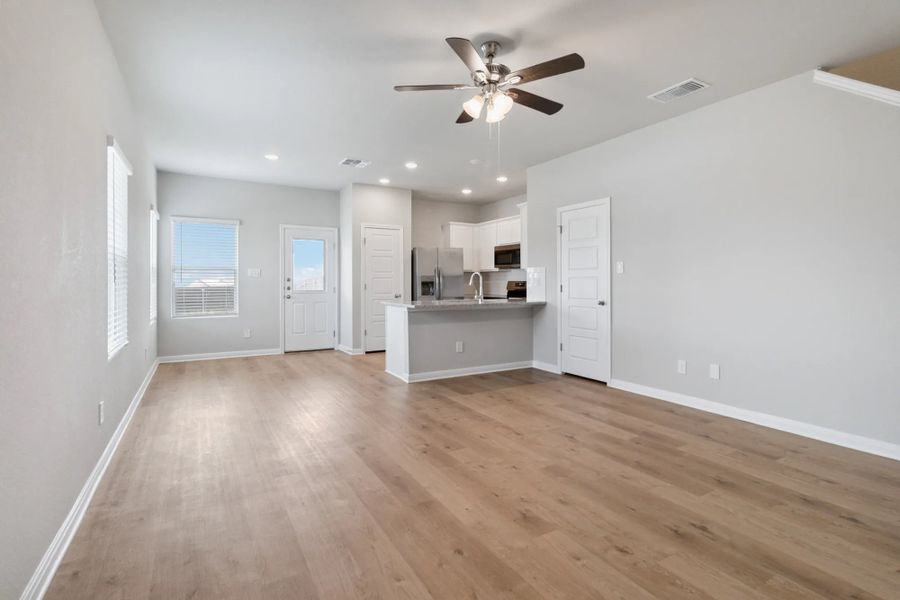 Representative unfurnished interior of a home built from the Duplex 5736 by TwoTen Communities in Emma Park, Buda (Image 19).