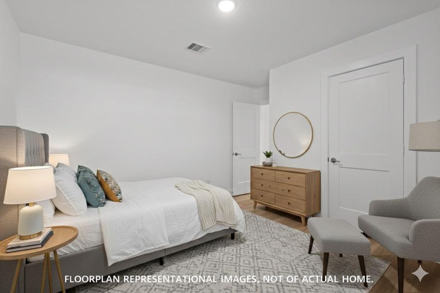 Furnished interior view inside a new home in Pinewood at Grand Texas, New Caney (Image 7).