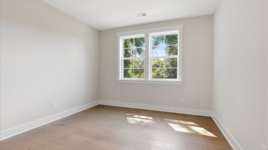 Representative furnished interior of a home built from the Lighthouse II by DRB Homes in Bayview Acres, Mount Pleasant (Image 28).