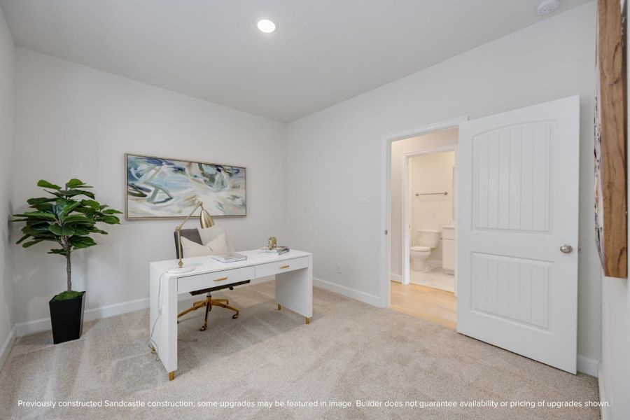 A secondary bedroom on the second floor presents a perfect blend of comfort and functionality, complete with a desk, window, and proximity to the shared hall bathroom. A secondary bedroom on the second floor presents a perfect blend of comfort and functionality, complete with a desk, window, and proximity to the shared hall bathroom.