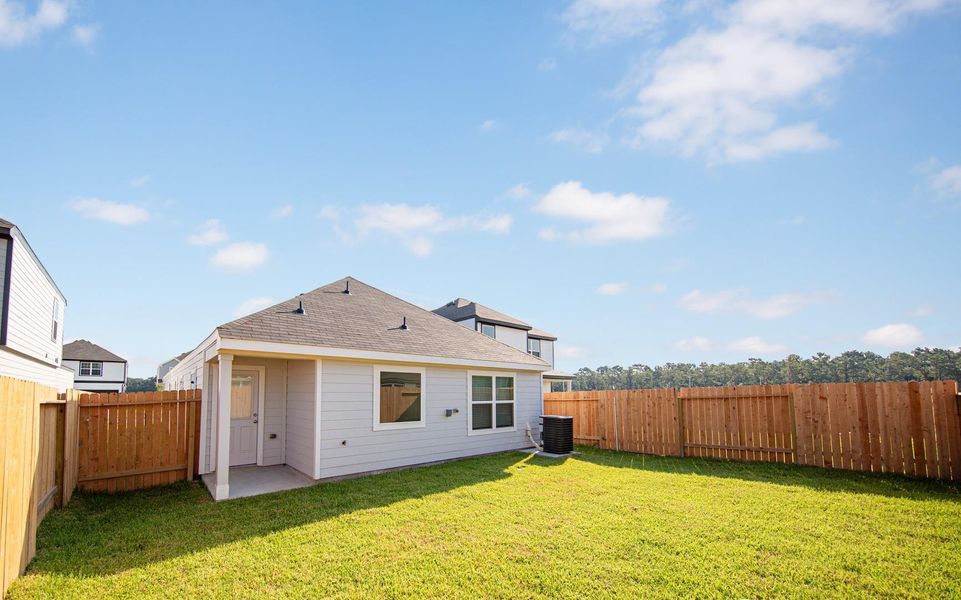 Exterior details and patio area of a home in Wayside Village, Houston (Image 2). Exterior details and patio area of a home in Wayside Village, Houston (Image 2).