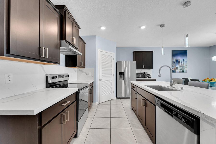 Furnished interior view inside a new home in , Port St. Lucie (Image 16).