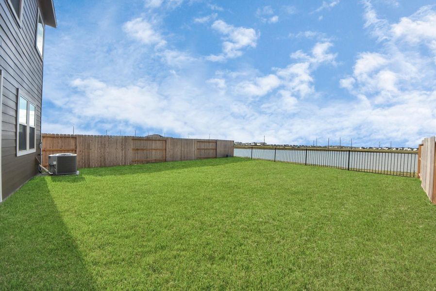 Fully fenced back yard with patio, lake view, no back neighbors