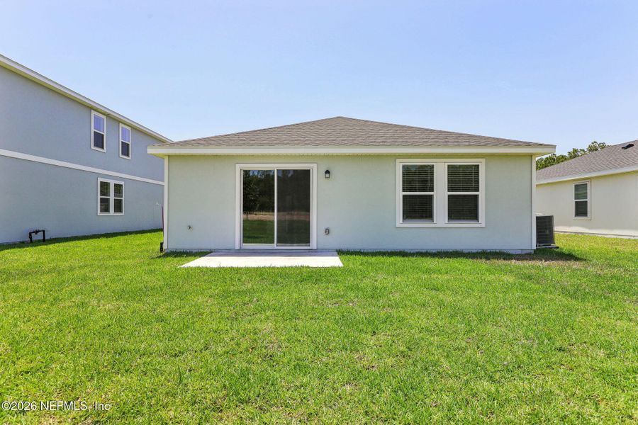 Exterior details and patio area of a home in Flagler Village - Classic Series, Palm Coast (Image 22).