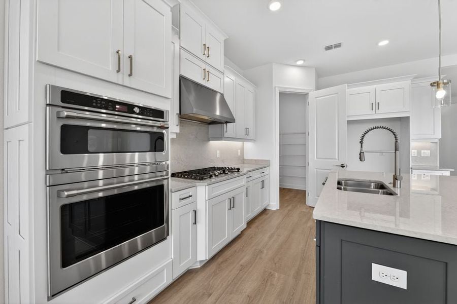 Representative furnished interior of a home built from the Sereno by Taylor Morrison in Esplanade by the Islands, Naples (Image 5).