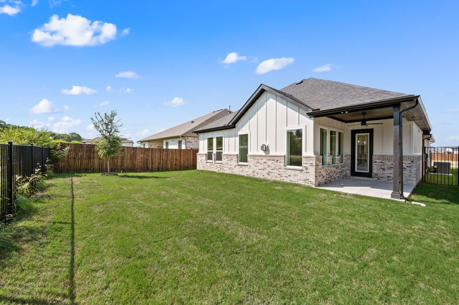 Exterior details and patio area of a home in Parks of Aledo, Aledo (Image 28).