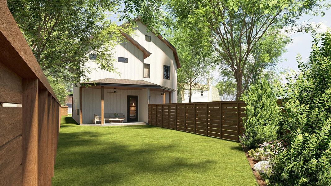 Rear view of house featuring a fenced backyard, a patio area, and ceiling fan