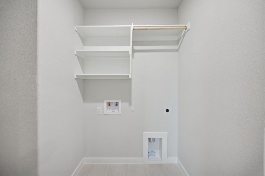 Utility Room in the Masters home plan by Trophy Signature Homes – REPRESENTATIVE PHOTO