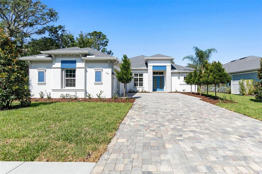 Front exterior of a new home in , Palm Coast, FL, highlighting curb appeal (Image 31). Front exterior of a new home in , Palm Coast, FL, highlighting curb appeal (Image 31).