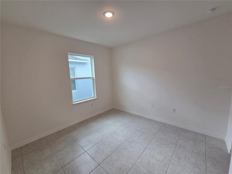Spacious, unfurnished interior of a new home in Hammock Reserve, Haines City (Image 23). Spacious, unfurnished interior of a new home in Hammock Reserve, Haines City (Image 23).