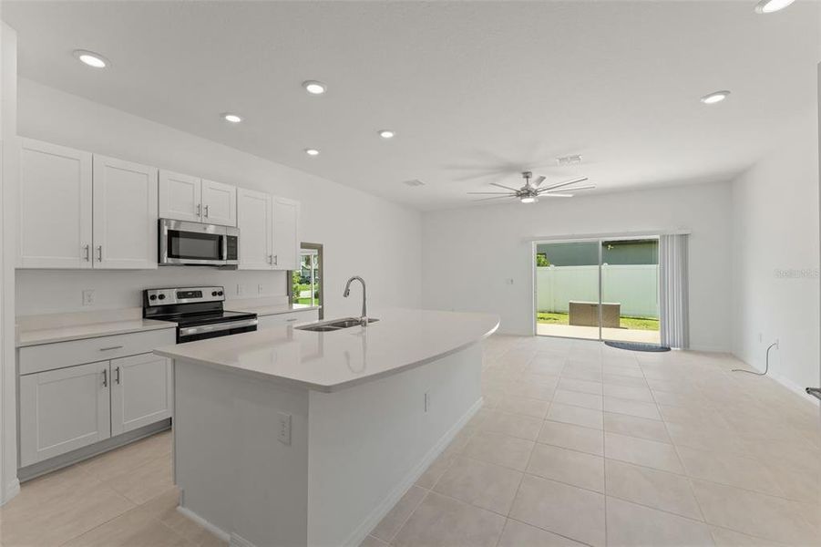 Furnished interior view inside a new home in , Kissimmee (Image 14). Furnished interior view inside a new home in , Kissimmee (Image 14).