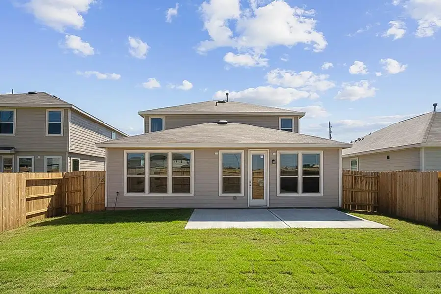 Come explore this expansive backyard featuring a beautiful covered patio—perfect for outdoor living! There's ample space for kids to play and adults to unwind. Ideal for patio furniture, a BBQ pit, and so much more—the possibilities are endless!