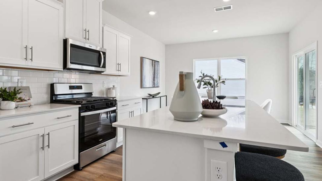 Furnished interior view inside a new home in Reedy Creek Preserve, Charlotte (Image 9).