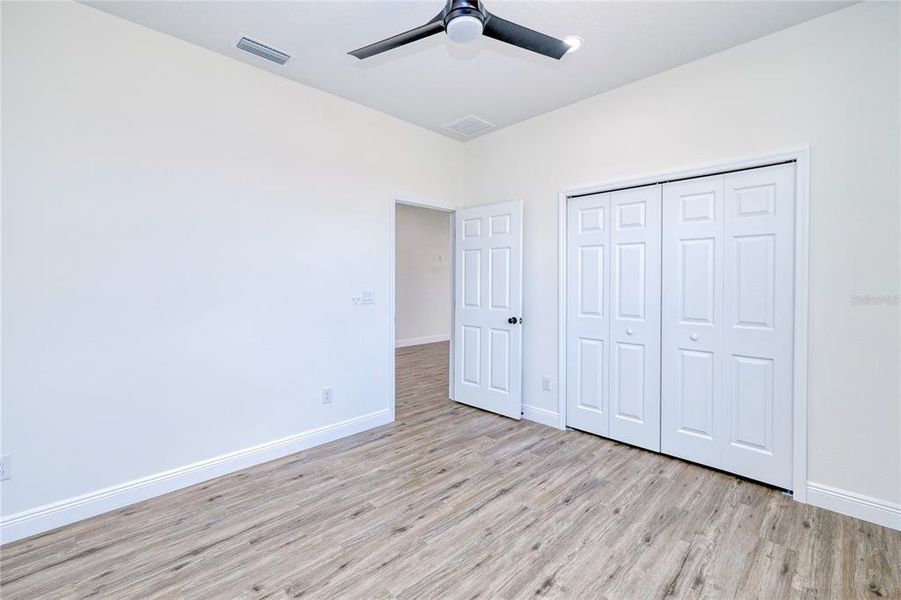 Spacious, unfurnished interior of a new home in , Port Charlotte (Image 27).