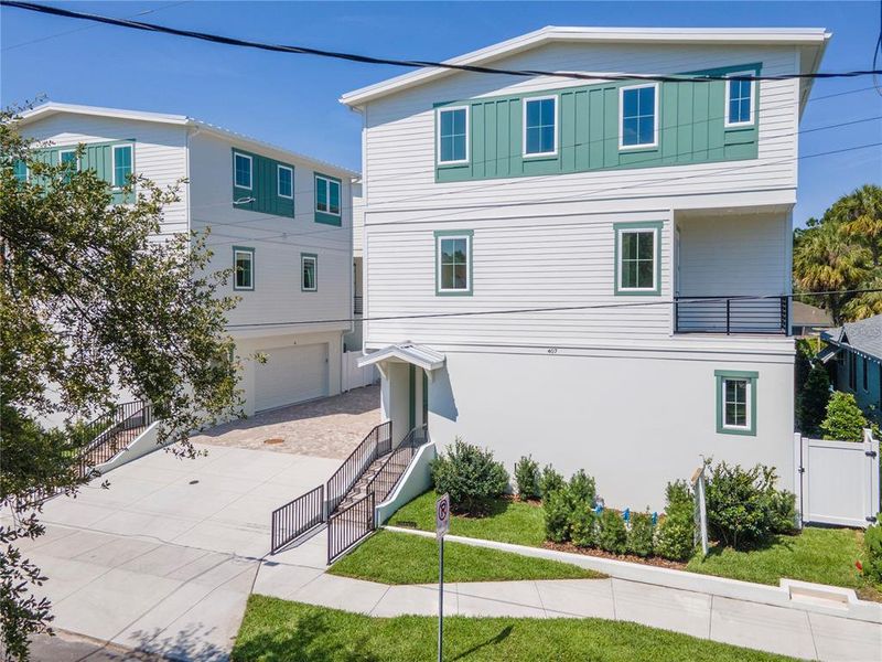 Front exterior of a new home in , Tampa, FL, highlighting curb appeal (Image 2). Front exterior of a new home in , Tampa, FL, highlighting curb appeal (Image 2).