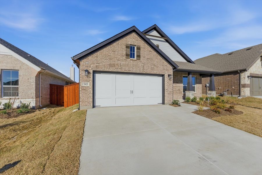 Front exterior of a new home in Morningstar, Aledo, TX, highlighting curb appeal (Image 22).