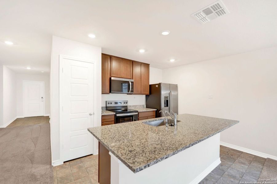 Furnished interior view inside a new home in , San Antonio (Image 12).