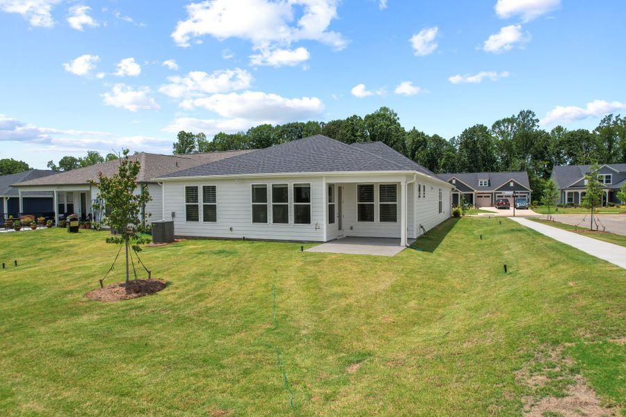 Exterior details and patio area of a home in Carolina Riverside, Belmont (Image 39).
