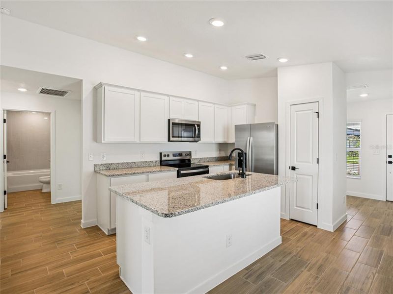 Furnished interior view inside a new home in Trilby Crossing, Brooksville (Image 6).