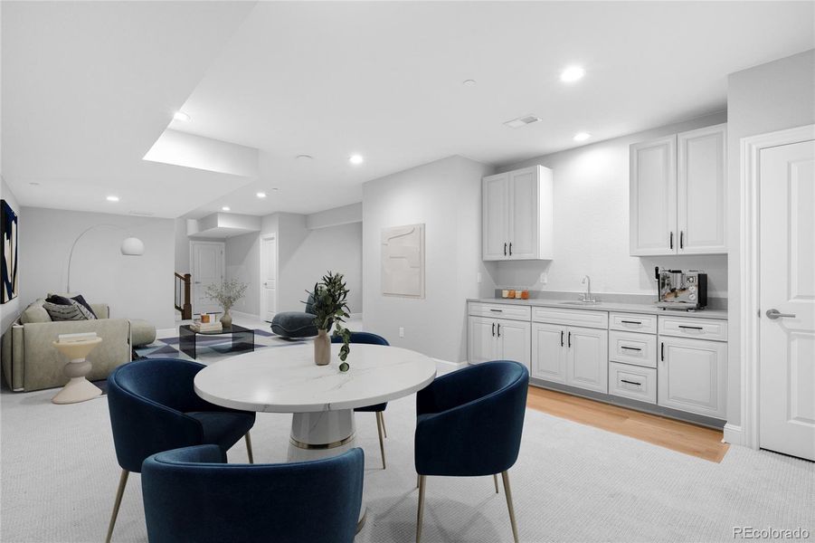 Wet bar completes the space, perfect for entertaining