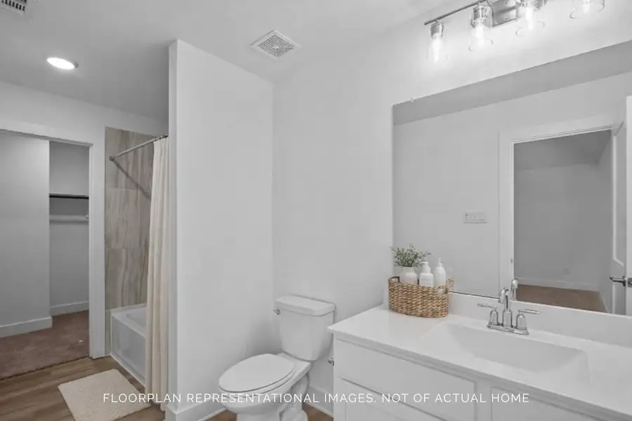 Furnished interior view inside a new home in Sorella, Tomball (Image 10).