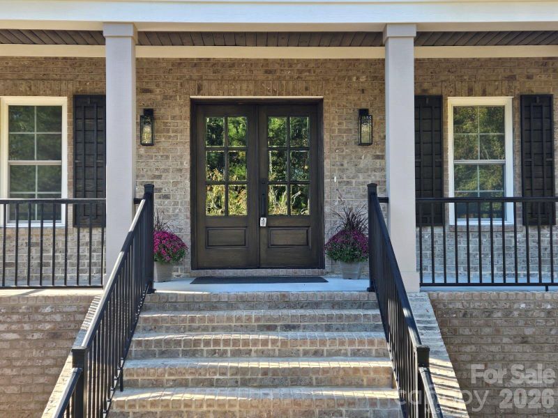 Exterior details and patio area of a home in , Hickory (Image 3).