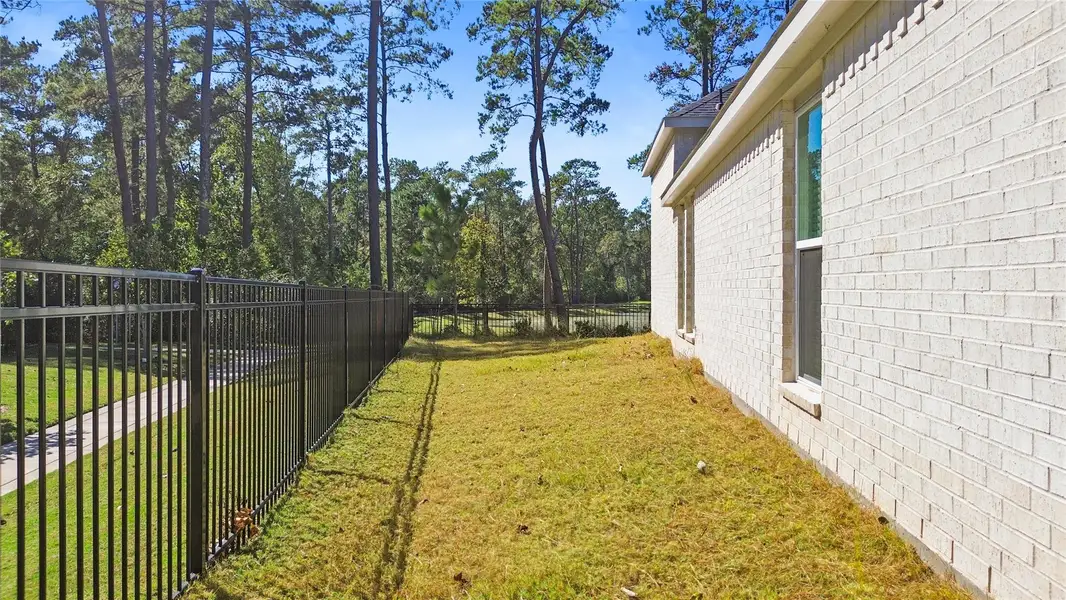 Exterior details and patio area of a home in Audubon Park 70', Magnolia (Image 1).