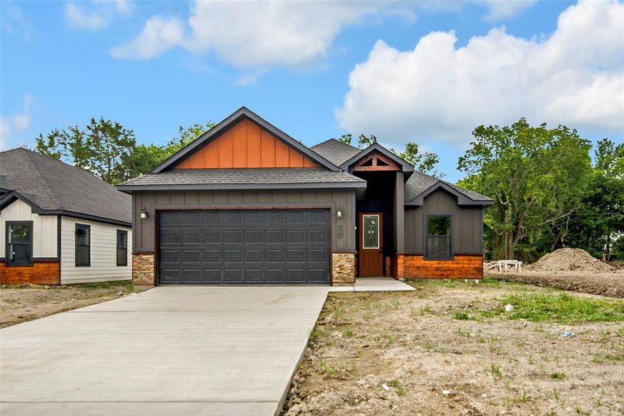 Front exterior of a new home in , Whitewright, TX, highlighting curb appeal (Image 15). Front exterior of a new home in , Whitewright, TX, highlighting curb appeal (Image 15).