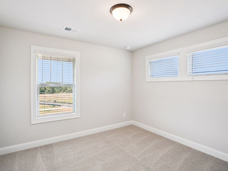 Spacious, unfurnished interior of a new home in Hemingway - Highland Series, Cumming (Image 16).
